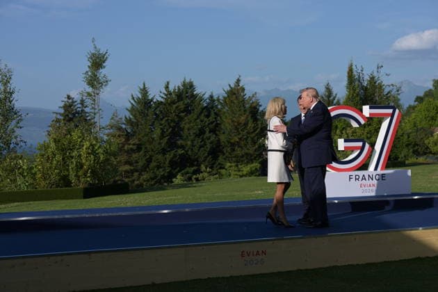 RECORD DATE NOT STATED G7 Summit - Welcoming Ceremony By President Macron And Wife U.S. President Donald Trump at the official welcoming ceremony hosted by French President Emmanuel Macron and his wife First Lady of France, Brigitte Macron during G7 Summit at the Hotel Royal in Evian-les-Bains, France on June 15, 2026. A G7 summit is set to take place June 15 to 17 in the French town of Evian-les-Bains near Switzerland and it will be attended by country leaders as well as the EU s foreign policy chief and ministers from Brazil, Canada, the United Arab Emirates and Turkey. Photo by Ammar Abd Rabbo ABACAPRESS.COM Evian-les-Bains France  Copyright: xAbdxRabboxAmmar ABACAx