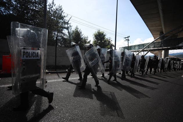 CNTE teachers protest in Mexico City on 15th day of strike MEXICO CITY, MEXICO - JUNE 15: Riot police stand guard during a protest by CNTE teachers at a toll booth in southern Mexico City, Mexico on June 15, 2026. Members of National Coordination of Education Workers (CNTE) staged protests at multiple toll booths, allowing motorists to pass without paying as their national strike reached its 15th day. Daniel Cardenas Anadolu Mexico City Mexico. Editorial use only. Please get in touch for any other usage.  Copyright: x2026xAnadoluxDanielxCardenasx