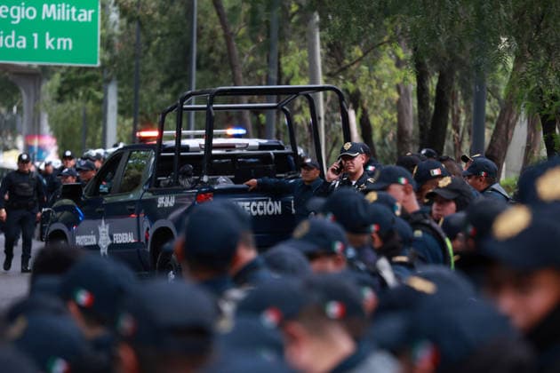 CNTE teachers protest in Mexico City on 15th day of strike MEXICO CITY, MEXICO - JUNE 15: Riot police stand guard during a protest by CNTE teachers at a toll booth in southern Mexico City, Mexico on June 15, 2026. Members of National Coordination of Education Workers (CNTE) staged protests at multiple toll booths, allowing motorists to pass without paying as their national strike reached its 15th day. Daniel Cardenas Anadolu Mexico City Mexico. Editorial use only. Please get in touch for any other usage.  Copyright: x2026xAnadoluxDanielxCardenasx