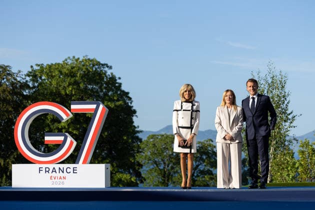(260615) -- EVIAN, June 15, 2026 -- French President Emmanuel Macron (R) and Italian Prime Minister Giorgia Meloni (C) pose for photos during the G7 summit in Evian, France, June 15, 2026. The Group of Seven (G7) summit kicked off on Monday in Evian, a town in eastern France, against the backdrop of massive demonstration. ( Handout via Xinhua) FRANCE-EVIAN-G7 SUMMIT-KICK OFF FrenchxMinistryxofxEuropexandxForeignxAffairs 