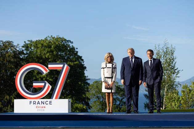 (260615) -- EVIAN, June 15, 2026 -- French President Emmanuel Macron (R) and U.S. President Donald Trump (C) pose for photos during the G7 summit in Evian, France, June 15, 2026. The Group of Seven (G7) summit kicked off on Monday in Evian, a town in eastern France, against the backdrop of massive demonstration. ( Handout via Xinhua) FRANCE-EVIAN-G7 SUMMIT-KICK OFF FrenchxMinistryxofxEuropexandxForeignxAffairs 