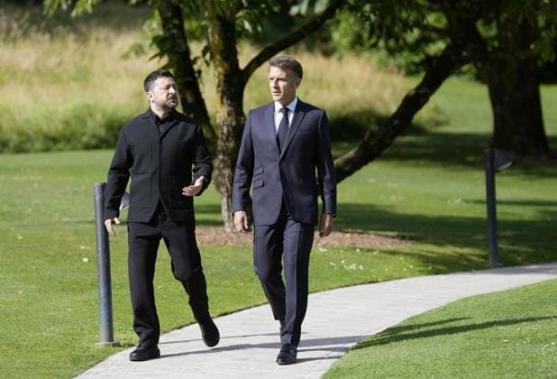 G7 summit in France Ukrainian President Volodymyr Zelenskyy (L) converses with French President Emmanuel Macron as he arrives at the venue of a Group of Seven summit in Evian-les-Bains, France, on June 16, 2026.  A14AA0005619045P