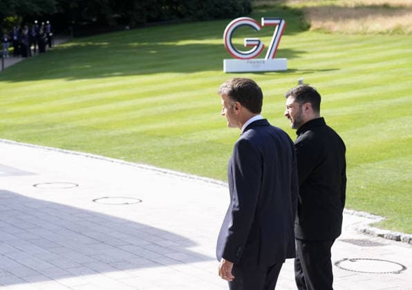 G7 summit in France Ukrainian President Volodymyr Zelenskyy (R) converses with French President Emmanuel Macron as he arrives at the venue of a Group of Seven summit in Evian-les-Bains, France, on June 16, 2026.  A14AA0005619046P