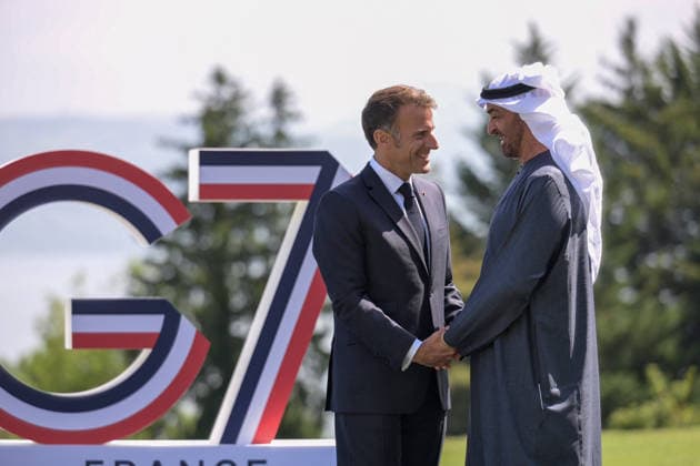 G7 Summit - Macron Welcomes MBZ France s President Emmanuel Macron (R) welcomes United Arab Emirates Crown prince Mohammed Bin Zayed Al Nahyan (MBZ) for the official greeting ahead of a work lunch as part of the G7 summit, in Evian, eastern France, on June 16, 2026. A G7 summit is set to take place June 15 to 17 in the French town of Evian-les-Bains near Switzerland and it will be attended by country leaders as well as the EU s foreign policy chief and ministers from Brazil, Canada, the United Arab Emirates and Turkey. Photo by Ammar Abd Rabbo ABACAPRESS.COM Evian France  Copyright: xAbdxRabboxAmmar ABACAx