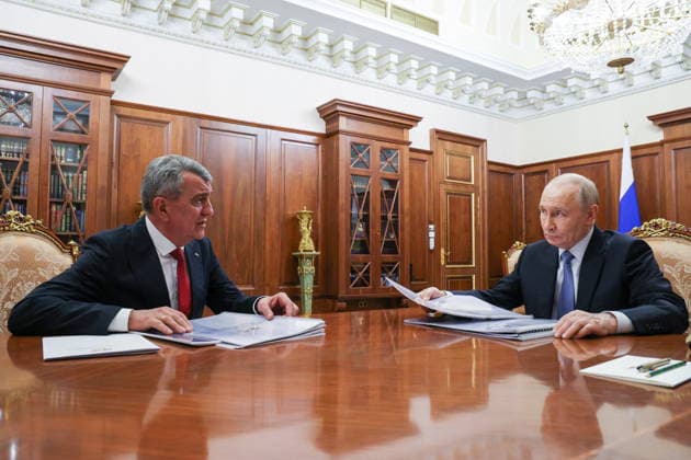 RUSSIA, MOSCOW - JUNE 16, 2026: Russia s President Vladimir Putin (R) and Sergei Menyailo, head of Russia s Republic of North Ossetia-Alania, meet at Moscow s Kremlin. Vyacheslav Prokofyev Russian Presidential Press and Information Office TASS  93892555
