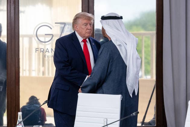 U.S. President Donald Trump greets United Arab Emirates (UAE) President Sheikh Mohamed bin Zayed Al Nahyan (MBZ) during a working lunch as part of the G7 summit in Evian, eastern France, on June 16, 2026. A G7 summit is scheduled to take place June 15–17 in the French town of Évian-les-Bains near Switzerland, and it will be attended by national leaders as well as the EU’s foreign policy chief and ministers from Brazil, Canada, the United Arab Emirates, and Turkey. Ammar Abd Rabbo Pool Bestimage Évian-les-Bains, France,detected_source_language  Copyright: xAmmarxAbdxRabbo Pool BestimagexAmmarxAbdxRabbo Pool Bestimagex