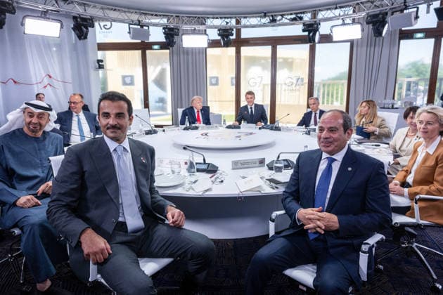 G7 Summit - Work Lunch Germany s Chancellor Friedrich Merz, European Council President Antonio Costa, US President Donald Trump, France s President Emmanuel Macron, Canada s Prime Minister Mark Carney, UAE s President Sheikh Mohamed bin Zayed al-Nahyan, Italy s Prime Minister Giorgia Meloni, Japan s Prime Minister Sanae Takaichi,European Commission President Ursula von der Leyen and Qatar s Emir Sheikh Tamim bin Hamad al-Thani during a work lunch as part of the G7 summit, in Evian, eastern France, on June 16, 2026. A G7 summit is set to take place June 15 to 17 in the French town of Evian-les-Bains near Switzerland and it will be attended by country leaders as well as the EU s foreign policy chief and ministers from Brazil, Canada, the Unit  Copyright: xAbdxRabboxAmmar ABACAx