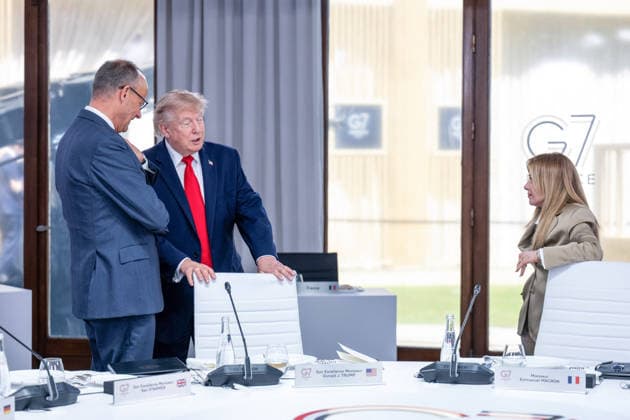 G7 Summit - Work Lunch US President Donald Trump (C) speaks with Germany s Chancellor Friedrich Merz, Italy s Prime Minister Giorgia Meloni during a work lunch as part of the G7 summit, in Evian, eastern France, on June 16, 2026. A G7 summit is set to take place June 15 to 17 in the French town of Evian-les-Bains near Switzerland and it will be attended by country leaders as well as the EU s foreign policy chief and ministers from Brazil, Canada, the United Arab Emirates and Turkey. Photo by Ammar Abd Rabbo ABACAPRESS.COM Evian France  Copyright: xAbdxRabboxAmmar ABACAx