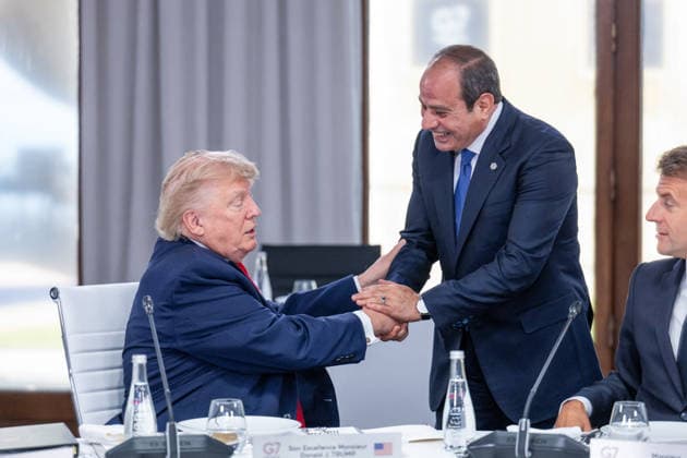 G7 Summit - Work Lunch US President Donald Trump speaks with Egypt s President Abdel Fattah al-Sisi and France s President Emmanuel Macron during a work lunch as part of the G7 summit, in Evian, eastern France, on June 16, 2026. A G7 summit is set to take place June 15 to 17 in the French town of Evian-les-Bains near Switzerland and it will be attended by country leaders as well as the EU s foreign policy chief and ministers from Brazil, Canada, the United Arab Emirates and Turkey. Photo by Ammar Abd Rabbo ABACAPRESS.COM Evian France  Copyright: xAbdxRabboxAmmar ABACAx