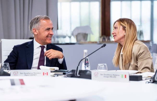 June 16, 2026, Evian-Les-Bains, France: Prime Minister Mark Carney and Prime Minister of Italy Giorgia Meloni speak at a working luncheon during the G7 summit in Evian-les-Bains, France on Tuesday, June 16, 2026. Evian-Les-Bains France  - ZUMAc35_ 20260616_zaf_c35_032 Copyright: xChristopherxKatsarovx