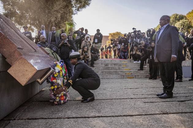 50th anniversary of Soweto Uprising marked in Johannesburg??????? JOHANNESBURG, SOUTH AFRICA - JUNE 16: South African President Cyril Ramaphosa (R) lays carnations to the Soweto Uprising memorial as he attends the commemoration ceremony held on the 50th anniversary of June 16 National Youth Day, marked in honor of those who lost their lives during the Soweto Uprising, which was launched by Black students in 1976 against the apartheid regime s decision to make Afrikaans compulsory in education and led to widespread protests across the country, in the Soweto district of Johannesburg, South Africa on June 16, 2026. As part of the ceremony, South Africans march along the route where the uprising was most intense and many people were killed, acc  Copyright: x2026xAnadoluxIhsaanxHaffejeex