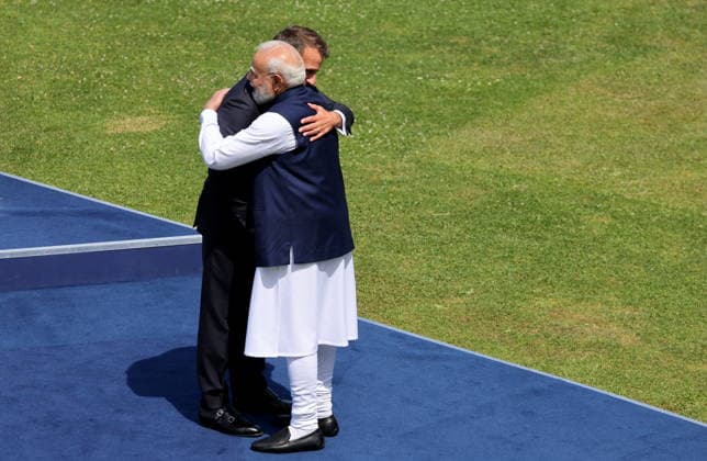 French President Emmanuel Macron welcomes Indian Prime Minister Narendra Modi for the official greeting ahead of a working lunch as part of the G7 summit, in Évian, France, on June 16, 2026. Dominique Jacovides, Bestimage, Évian-les-Bains, France,detected_source_language  Copyright: xDOMINIQUExJACOVIDESx xBESTIMAGExDOMINIQUExJACOVIDESx xBESTIMAGEx