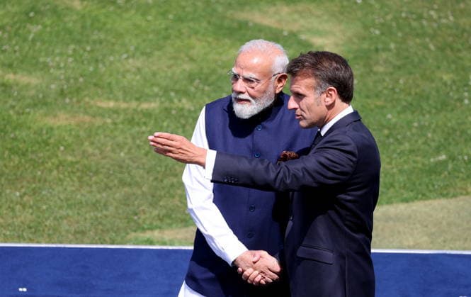 French President Emmanuel Macron welcomes Indian Prime Minister Narendra Modi for the official greeting ahead of a working lunch as part of the G7 summit, in Évian, France, on June 16, 2026. Dominique Jacovides, Bestimage, Évian-les-Bains, France,detected_source_language  Copyright: xDOMINIQUExJACOVIDESx xBESTIMAGExDOMINIQUExJACOVIDESx xBESTIMAGEx