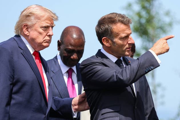 French President Emmanuel Macron (R) gestures next to U.S. President Donald Trump during a family photo session as part of the G7 summit in Evian, eastern France, on June 16, 2026. A G7 summit is scheduled to take place June 15–17 in the French town of Évian-les-Bains, near Switzerland, and will be attended by national leaders as well as the EU’s foreign policy chief and ministers from Brazil, Canada, the United Arab Emirates, and Turkey. Ludovic Marin, Pool Bestimage, Évian-les-Bains, France,detected_source_language  Copyright: xLudovicxMarin Pool BestimagexLudovicxMarin Pool Bestimagex