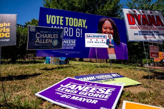 Signs for Janeese Lewis George, a candidate for DC Mayor, is seen outside Sherwood Recreation Center as people vote in Washington DC s 2026 primary elections on Tuesday, June 16, 2026. The two front-runners to succeed current DC Mayor Muriel Bowser are Kenyan McDuffie, a moderate with support from many of Bowser s cabinet, and Janeese Lewis George, democratic socialist who built her campaign around organized labor.  WAP20260616303 BONNIExCASH