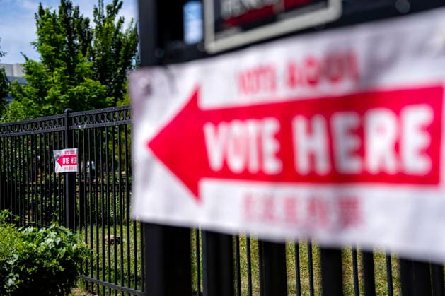 Vote Here signs are seen outside Sherwood Recreation Center as people vote in Washington DC s 2026 primary elections on Tuesday, June 16, 2026. The two front-runners to succeed current DC Mayor Muriel Bowser are Kenyan McDuffie, a moderate with support from many of Bowser s cabinet, and Janeese Lewis George, democratic socialist who built her campaign around organized labor.  WAP20260616305 BONNIExCASH