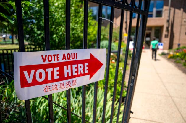 People arrive at Sherwood Recreation Center to vote in Washington DC s 2026 primary elections on Tuesday, June 16, 2026.The two front-runners to succeed current DC Mayor Muriel Bowser are Kenyan McDuffie, a moderate with support from many of Bowser s cabinet, and Janeese Lewis George, democratic socialist who built her campaign around organized labor.  WAP20260616308 BONNIExCASH