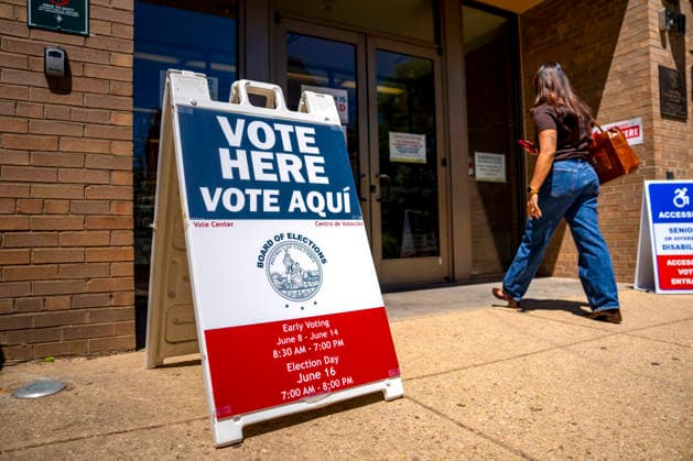 People arrive at Sherwood Recreation Center to vote in Washington DC s 2026 primary elections on Tuesday, June 16, 2026.The two front-runners to succeed current DC Mayor Muriel Bowser are Kenyan McDuffie, a moderate with support from many of Bowser s cabinet, and Janeese Lewis George, democratic socialist who built her campaign around organized labor.  WAP20260616310 BONNIExCASH