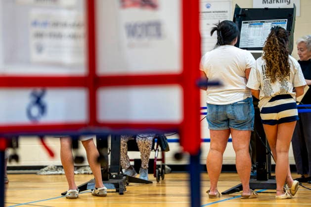 People vote in Washington DC s 2026 primary elections at Sherwood Recreation Center on Tuesday, June 16, 2026. The two front-runners to succeed current DC Mayor Muriel Bowser are Kenyan McDuffie, a moderate with support from many of Bowser s cabinet, and Janeese Lewis George, democratic socialist who built her campaign around organized labor.  WAP20260616313 BONNIExCASH