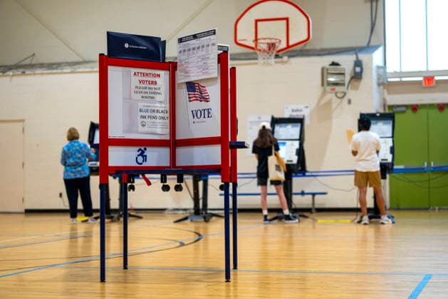 People vote in Washington DC s 2026 primary elections at Sherwood Recreation Center on Tuesday, June 16, 2026. The two front-runners to succeed current DC Mayor Muriel Bowser are Kenyan McDuffie, a moderate with support from many of Bowser s cabinet, and Janeese Lewis George, democratic socialist who built her campaign around organized labor.  WAP20260616318 BONNIExCASH