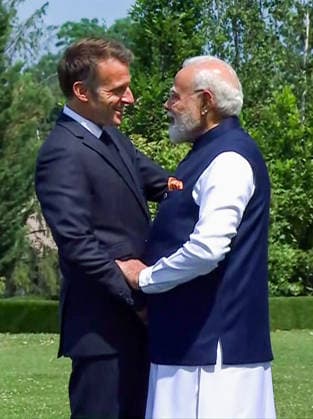 RECORD DATE NOT STATED French Prez Emmanuel Macron welcomes PM Modi at the venue of the G7 Summit Evian, France , Jun 16 (ANI): French President Emmanuel Macron welcomes Prime Minister Narendra Modi at the venue of the G7 Summit 2026, in Evian on Tuesday. (DD ANI Video Grab) Evian France Copyright: xANIx ANI_20260616273