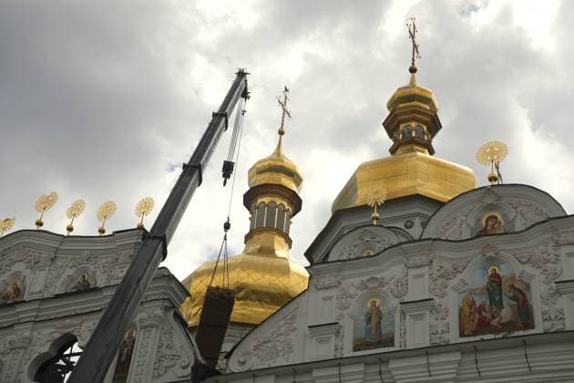 Emergency repair works are underway on the roof of the Dormition Cathedral at the Kyiv Pechersk Lavra, which was hit by a Russian drone during a massive attack on the Ukrainian capital on Monday night, June 15, Kyiv, Ukraine, June 16, 2026. The strike triggered a large-scale fire that covered about 800 sq m and damaged 80% of the roof structure. (Photo by Yuliia Ovsiannikova Ukrinform) Briefing on aftermath of Russian attack on cultural heritage sites of Kyiv  Copyright: xYuliiaxOvsiannikovax