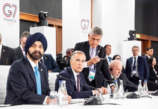 June 16, 2026, Evian-Les-Bains, France: Prime Minister of Canada Mark Carney, centre seated, looks on during the official G7 working session at the G7 summit between World Bank President Ajay Banga, left, and Brazilian President Luiz Inacio Lula da Silva, in Evian-les-Bains, France, on Tuesday, June 16, 2026. Evian-Les-Bains France  - ZUMAc35_ 20260616_zaf_c35_082 Copyright: xChristopherxKatsarovx