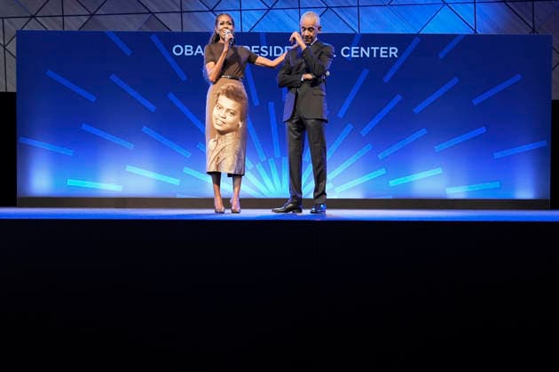 Former first lady Michelle Obama putting her arm on former President Barack Obama as she delivers remarks at a stakeholders event at the Obama Presidential Center, Tuesday, June 16, 2026, in Chicago, Illinois. The Obama Library officially opens to the public on Friday June 19, 2026. Pool  CHI2026061603 PabloxMartinezxMonsivais
