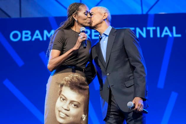 Former President Barack Obama kisses former first lady Michelle Obama at a stakeholders event at the Obama Presidential Center, Tuesday, June 16, 2026, in Chicago, Illinois. The Obama Library officially opens to the public on Friday June 19, 2026. Pool  CHI2026061602 PabloxMartinezxMonsivais
