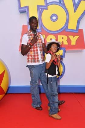 IPA85769489 - Rome, Teatro Sistina: Preview of the movie Toy Story 5. Pictured: Amadou with his father  Copyright: xVincenzoxLandix xVincenzoxLandix 85769489