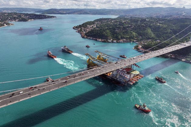 World s 3rd-largest semi-submersible crane vessel transits Bosphorus Strait ISTANBUL, TURKIYE - JUNE 17: An aerial view of the Saipem 7000, the world s third-largest semi-submersible crane vessel used in natural gas pipeline construction, as it transits the Bosphorus near the Fatih Sultan Mehmet Bridge during its voyage from Libya to Romania in Istanbul, Turkiye, on June 17, 2026. Cemal Yurttas Anadolu Istanbul Turkey. Editorial use only. Please get in touch for any other usage.  Copyright: x2026xAnadoluxCemalxYurttasx