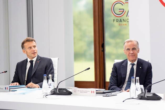 June 17, 2026, Evian-Les-Bains, France: President of France Emmanuel Macron, left, and Prime Minister Mark Carney look on ahead of a G7 working session at the G7 summit in Evian-les-Bains, France, on Wednesday, June 17, 2026. Evian-Les-Bains France  - ZUMAc35_ 20260617_zaf_c35_004 Copyright: xChristopherxKatsarovx