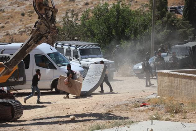 Israeli Forces Demolish Palestinian Family Home in Masafer Yatta MASAFER YATTA, WEST BANK JUNE 17, 2026: Israeli occupation forces demolished a Palestinian family home in the village of Deirat, in the Masafer Yatta area south of Hebron, displacing a couple and their five children. Israeli authorities said the structure was built without a permit. The demolition is part of ongoing disputes over construction and land use in the area. MASAFER YATTA Palestine, State of Copyright: x xMosabxshawerx xJNAxPressx