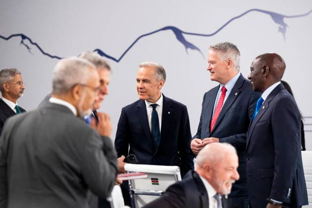June 17, 2026, Evian-Les-Bains, France: Prime Minister Mark Carney, centre, speaks with Secretary-General of the OECD, Mathias Cormann, President of Kenya, William Ruto, right, and other dignitaries ahead of a G7 working session at the G7 summit in Evian-les-Bains, France, on Wednesday, June 17, 2026. Evian-Les-Bains France  - ZUMAc35_ 20260617_zaf_c35_013 Copyright: xChristopherxKatsarovx