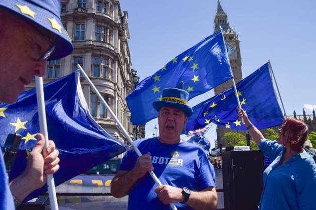 June 17, 2026, London, England, United Kingdom: STEVE BRAY and fellow activists hold European Union flags during the weekly anti-Brexit and pro-EU protest in Parliament Square. London United Kingdom  - ZUMAv130 20260617_zip_v130_005 Copyright: xVukxValcicx