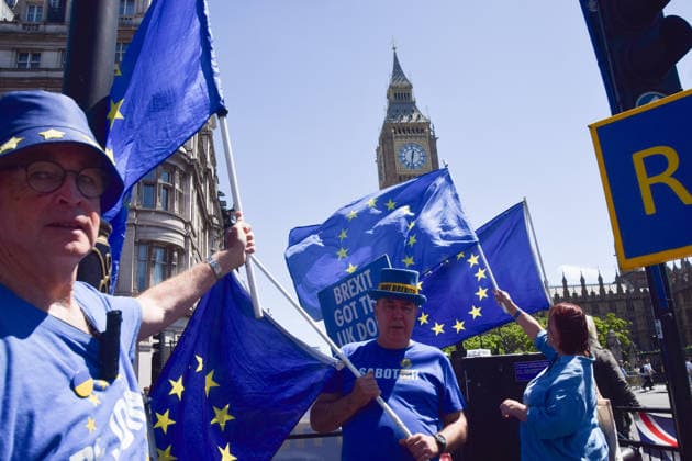June 17, 2026, London, England, United Kingdom: STEVE BRAY and fellow activists hold European Union flags during the weekly anti-Brexit and pro-EU protest in Parliament Square. London United Kingdom - ZUMAv130 20260617_zip_v130_006 Copyright: xVukxValcicx
