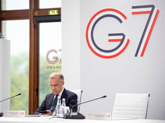 June 17, 2026, Evian-Les-Bains, France: Prime Minister Mark Carney waits for the arrival of dignitaries during a G7 working session at the G7 summit in Evian-les-Bains, France, on Wednesday, June 17, 2026. Evian-Les-Bains France  - ZUMAc35_ 20260617_zaf_c35_040 Copyright: xChristopherxKatsarovx