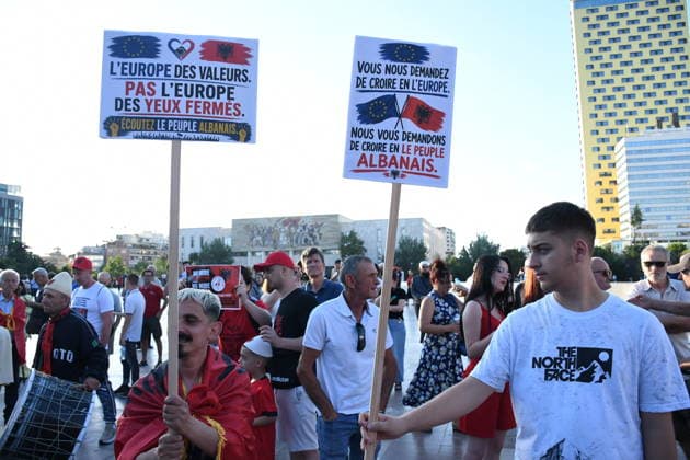 Anti-tourism project protests continue for 18th day in Albania TIRANA, ALBANIA - JUNE 17: Protests against a planned tourism project in the Zvernec area of the coastal city of Vlora continue for a 18th consecutive day in Tirana, Albania on June 17, 2026. Demonstrators gathered in Skanderbeg Square under the slogan Albania is not for sale, with a large number of participants joining the rally. Protesters opposed the reported sale of a beach in Zvernec as part of a tourism project allegedly linked to Ivanka Trump and Jared Kushner. Carrying banners, placards, and Albanian flags, demonstrators marched along the Boulevard of the Martyrs of the Nation toward the Prime Minister’s Office. Olsi Shehu Anadolu Tirana Albania. Editorial use only.  Copyright: x2026xAnadoluxOlsixShehux