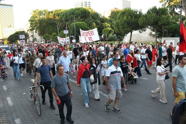 Anti-tourism project protests continue for 18th day in Albania TIRANA, ALBANIA - JUNE 17: Protests against a planned tourism project in the Zvernec area of the coastal city of Vlora continue for a 18th consecutive day in Tirana, Albania on June 17, 2026. Demonstrators gathered in Skanderbeg Square under the slogan Albania is not for sale, with a large number of participants joining the rally. Protesters opposed the reported sale of a beach in Zvernec as part of a tourism project allegedly linked to Ivanka Trump and Jared Kushner. Carrying banners, placards, and Albanian flags, demonstrators marched along the Boulevard of the Martyrs of the Nation toward the Prime Minister’s Office. Olsi Shehu Anadolu Tirana Albania. Editorial use only.  Copyright: x2026xAnadoluxOlsixShehux