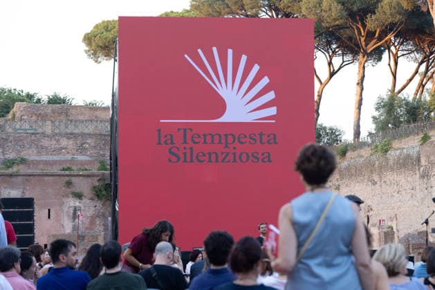IPA85796781 - The Silent Storm, a shared, collective reading experience conceived by Alessandro Baricco at the Palatino Stadium in Rome. Thousands of people read Fyodor Dostoevsky™s *White Nights* at the same time.  Copyright: xMatteoxNardonex xx 85796781