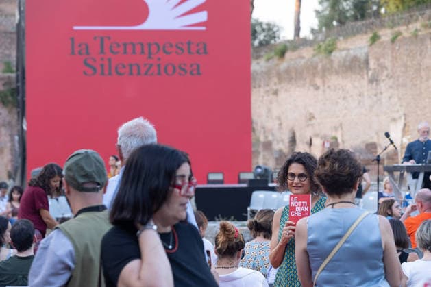 IPA85796784 - The Silent Storm, a shared, collective reading experience conceived by Alessandro Baricco at the Palatino Stadium in Rome. Thousands of people read Fyodor Dostoevsky™s *White Nights* simultaneously.  Copyright: xMatteoxNardonex xx 85796784