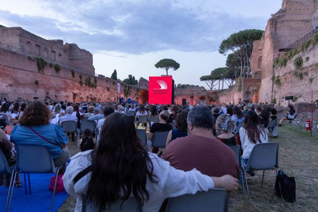IPA85796812 - The Silent Storm, a shared, collective reading experience conceived by Alessandro Baricco at the Palatino Stadium in Rome. Thousands of people read Fyodor Dostoevsky™s *White Nights* at the same time.  Copyright: xMatteoxNardonex xx 85796812