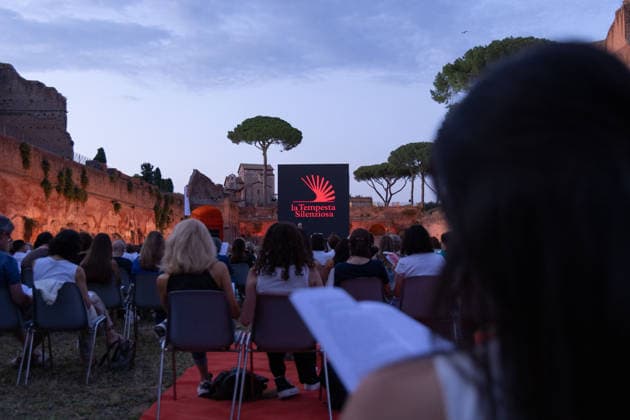 IPA85796819 - The Silent Storm, a shared, collective reading experience conceived by Alessandro Baricco at the Palatino Stadium in Rome. Thousands of people read Fyodor Dostoevsky™s *White Nights* simultaneously.  Copyright: xMatteoxNardonex xx 85796819