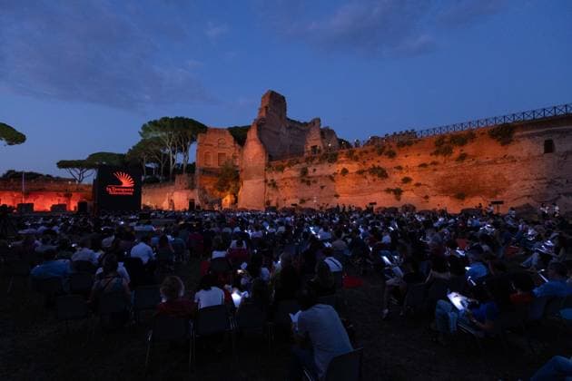 IPA85796824 - The Silent Storm, a shared, collective reading experience conceived by Alessandro Baricco at the Palatino Stadium in Rome. Thousands of people read Fyodor Dostoevsky™s *White Nights* simultaneously.  Copyright: xMatteoxNardonex xx 85796824