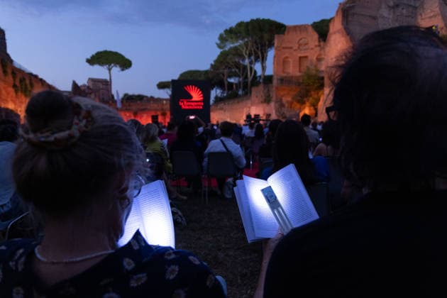 IPA85796821 - The Silent Storm, a shared, collective reading experience conceived by Alessandro Baricco at the Palatino Stadium in Rome. Thousands of people read Fyodor Dostoevsky™s *White Nights* simultaneously.  Copyright: xMatteoxNardonex xx 85796821