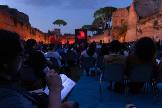 IPA85796822 - The Silent Storm, a shared, collective reading experience conceived by Alessandro Baricco at the Palatino Stadium in Rome. Thousands of people read Fyodor Dostoevsky™s *White Nights* at the same time.  Copyright: xMatteoxNardonex xx 85796822