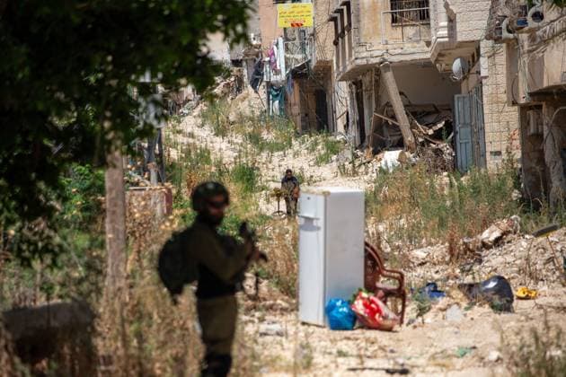 Displaced Families Granted Brief Access to Retrieve Belongings from Tulkarm Camp TULKARM REFUGEE CAMP, WEST BANK JUNE 17, 2026: Palestinian residents carry personal belongings after Israeli authorities allowed 45 families to enter Tulkarm refugee camp for a limited period to retrieve items from their homes. The visit comes amid the ongoing Israeli military operation in Tulkarm and Nur Shams refugee camps, which has displaced large numbers of residents and caused significant damage to homes and infrastructure. Photo by Mojahid Nawahda JNA Press. (Photo by Mojahid Nwahda JNA Press via Nexpher Images) TULKARM