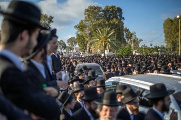 Ultra-Orthodox Jews opposing compulsory military service protest outside an Israeli prison KFAR YONA, ISRAEL - JUNE 17: Thousands of demonstrators gather outside the Beit Lid military prison, calling for the release of an Ultra-Orthodox youth who was arrested for refusing compulsory military service in Kfar Yona, Israel on June 17, 2026. Israeli forces took extensive security measures around the prison during the protest. photo by Roman Levin JNA Press (Photo by Roman Levin JNA Press via Nexpher Images) Kfar Yona