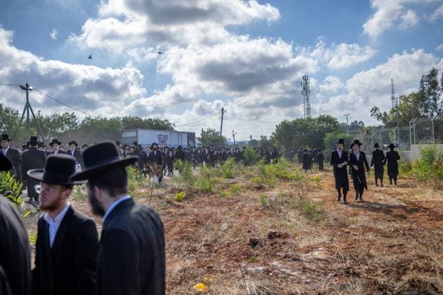 Ultra-Orthodox Jews opposing compulsory military service protest outside an Israeli prison KFAR YONA, ISRAEL - JUNE 17: Thousands of demonstrators gather outside the Beit Lid military prison, calling for the release of an Ultra-Orthodox youth who was arrested for refusing compulsory military service in Kfar Yona, Israel on June 17, 2026. Israeli forces took extensive security measures around the prison during the protest. photo by Roman Levin JNA Press (Photo by Roman Levin JNA Press via Nexpher Images) Kfar Yona