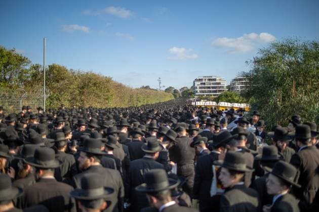Ultra-Orthodox Jews opposing compulsory military service protest outside an Israeli prison KFAR YONA, ISRAEL - JUNE 17: Thousands of demonstrators gather outside the Beit Lid military prison, calling for the release of an Ultra-Orthodox youth who was arrested for refusing compulsory military service in Kfar Yona, Israel on June 17, 2026. Israeli forces took extensive security measures around the prison during the protest. photo by Roman Levin JNA Press (Photo by Roman Levin JNA Press via Nexpher Images) Kfar Yona